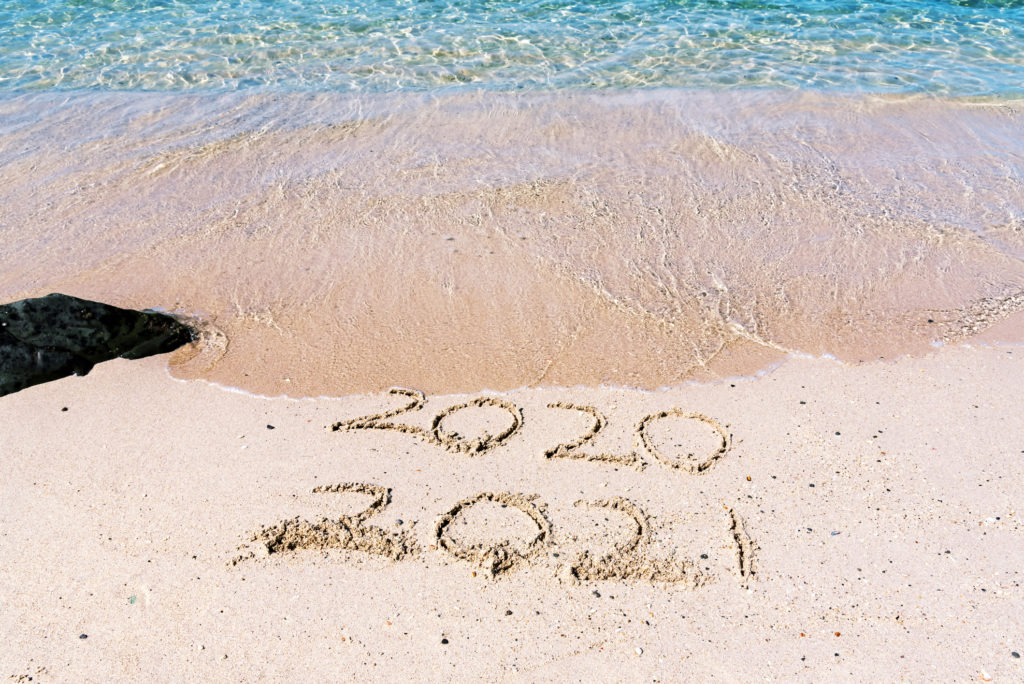 Number 2021 and 2020 at the Beach New Year Concept