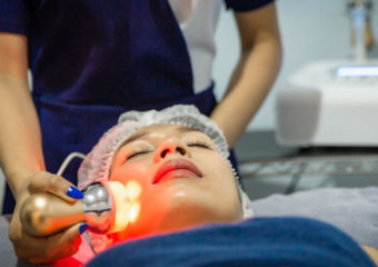 woman receiving laser treatment