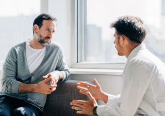 male patient getting advised on treatment