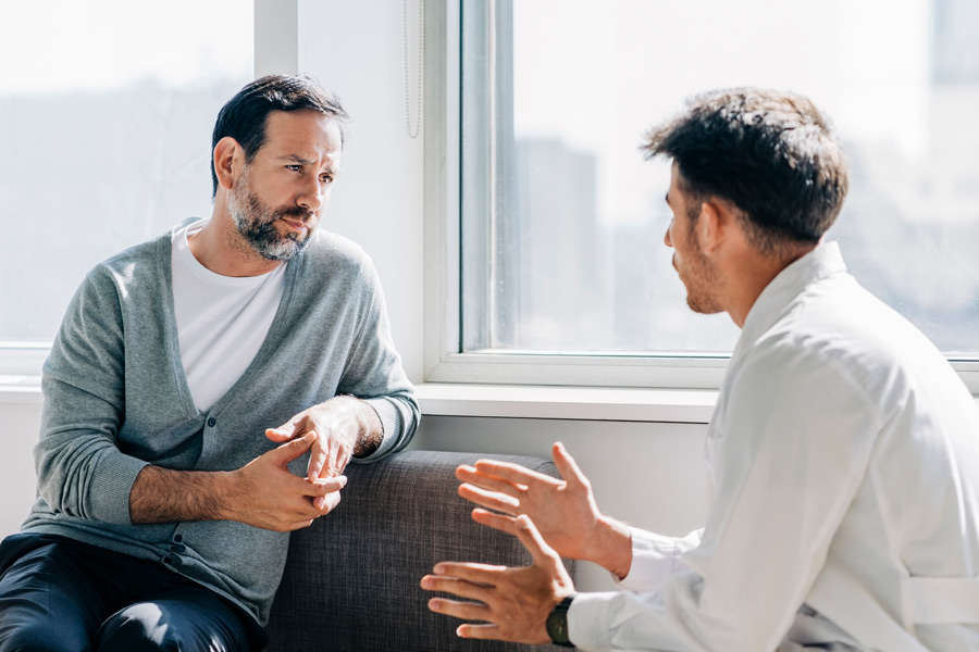 male patient getting advised on treatment